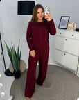 Soft button-up pyjamas made from viscose and polyester, comfortable home outfit for peaceful nights.