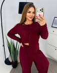 Soft button-up pyjamas made from viscose and polyester, comfortable design for bedtime and relaxation.