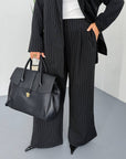 Striped business-style set with polyester, viscose and spandex, image of elegant business outfit.