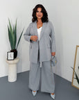 Striped business-style set with polyester, viscose and spandex, shown in the image.
