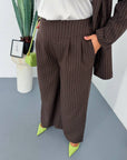 Striped business-style set with polyester, viscose and spandex, shown on a model, suitable for office and everyday clothing.