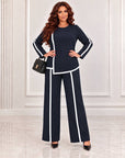 Blouse and trouser set made from polyester, viscose and lycra, with an elegant design, shown in the image.