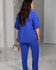 Set camicetta e pantaloni con bottoni