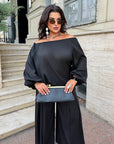 Set with wide-leg trousers made from polyester and lycra, image of elegant model with comfortable, stylish design.
