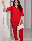 Conjunto blusa y pantalón abotonado