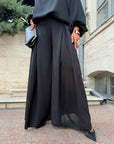 Set with wide-leg trousers made from polyester, lycra and nylon, in the photo, with an elegant design and comfortable cut.