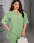 Комплект blouse и pants с копчета от polyester, lycra и nylon, моден и комфортен за ежедневна носия.
