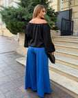 Set with wide-leg trousers made from polyester, lycra and nylon, with an elegant design and comfortable cut.