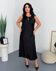Satin dress and soft jumper set, polyester, viscose and elastane, with an elegant design, image of a model.