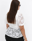 Lace blouse made from cotton and nylon with delicate design, light and sheer, suitable for stylish everyday clothes.