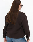 Cropped denim jacket made from cotton and polyester with elastane, model from the brand Composition, with modern cut and denim texture