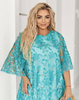 Short embroidered dress, модел NewYear25, от nylon, polyamide и lycra, показана на изображение.