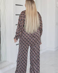 Printed set in a loose fit NewYear25 от polyester, viscose и elastane, изображение на модел.