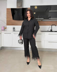 Trousers with feather decorations, made from polyester, viscose and spandex, with fashionable and elegant design.