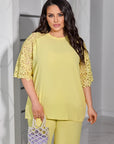 Conjunto de blusa y pantalón de encaje