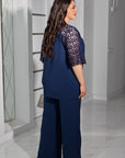 Completo blusa e pantaloni in pizzo