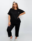 Set with cropped shorts  от cotton, polyester и elastane, подходящ за ежедневна носия, видим в изображението.