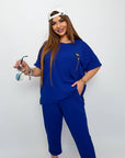 Set with cropped shorts  от cotton, polyester и elastane, с ясно видими скъсени pantsи и моден дизайн.