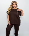 Set with cropped shorts  от cotton, polyester и elastane, с моден дизайн, показан в изображението.