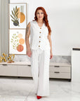 Set of vest and trousers  с polyester и viscose, стилен и удобен за ежедневна облеклост, в нежни цветове.