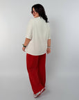 Knitwearен комплект с надпис, модел NewYear25, и Composition 80% cotton, 15% polyester, 5% elastane, българско производство.