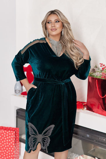 Fluwelen jurk met sprankelende applicatie