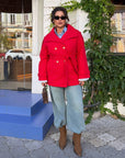 Set with a short cashmere coat with warm lining, polyester and viscose, displayed in the image.