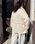 Short cashmere coat with warm lining and set, made from polyester and viscose, shown in the image.
