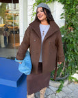 Set with a short coat with wool and warm lining, acrylic 80% and wool 20%, shown in the image.