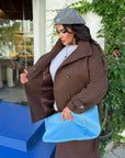 Set with short wool coat with warm lining made from acrylic and wool, image of a model, worn stylish winter set.