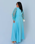 Long embroidered dress, model SV082025, made from polyester, shown on a model, with embroidery details and elegant design.