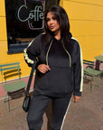 Hooded velvet set made from viscose, cotton and elastane, in luxurious style, shown in the photo.