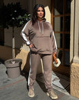 Hooded velvet set, composed of viscose, cotton and elastane, in cosy design and soft texture.