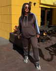 Hooded velvet set, composition of viscose, cotton and elastane, with soft texture and comfortable design.