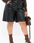 Faux-leather Bermuda shorts set with viscose, cotton and elastane, image of garment, stylish design and comfort.