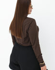 Soft turtleneck jumper from white cotton fabric, suitable for everyday wear, with comfortable cut and stylish design.