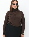 Soft turtleneck jumper from Composition, in beige, with comfortable cut and stretchy design, suitable for everyday style.