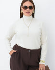 Soft turtleneck jumper from Composition, white, with long sleeves and comfortable design.