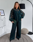 Set with a mesh bomber jacket made from polyester, viscose and spandex, with modern design, shown in the image.