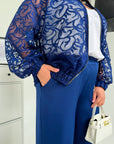 Set with a mesh bomber jacket made from polyester, viscose and spandex, with fashionable design, image of a model, suitable for stylish appearance.
