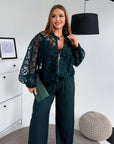 Set with a mesh bomber jacket made from polyester, viscose and spandex, with fashionable design, shown in the image.