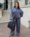 Satin-finish set with polyester, viscose and elastane, elegant and soft for stylish appearance.