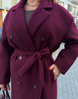 Long faux-cashmere coat with blue, made from polyester, viscose and wool, with classic cut.
