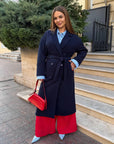 Long faux cashmere coat with polyester, viscose and wool, model with cut and details, suitable for autumn and winter.