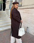 Long faux cashmere coat with polyester, viscose and wool, black, suitable for winter style.