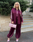 Satin-finish set with stripes made from polyester, viscose and elastane, image of elegant IT product.