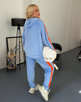 Hooded velvet set, grey, made from viscose, cotton and elastane, shown on a model, with soft and comfortable texture.