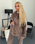 Hooded velvet set in beige, made from viscose, cotton and elastane, for comfort and style.