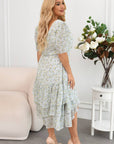 Asymmetric dress with ruffles  от viscose и polyester, подходяща за елегантен стил, показана на модел.
