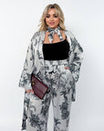 Printed set with a scarf  от polyester, viscose и elastan, показан върху White фон.